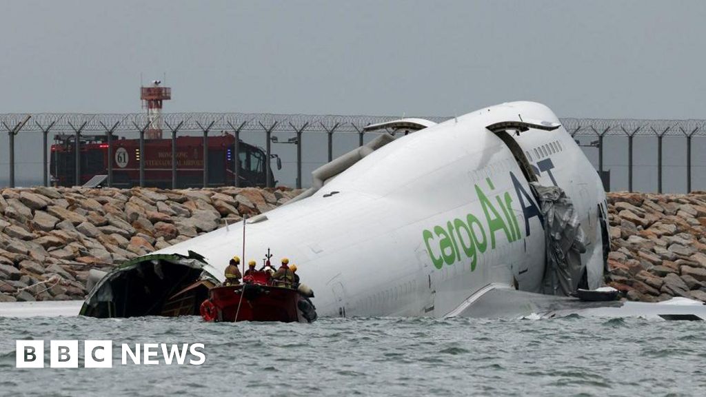 Two dead after cargo plane skids off Hong Kong runway into sea