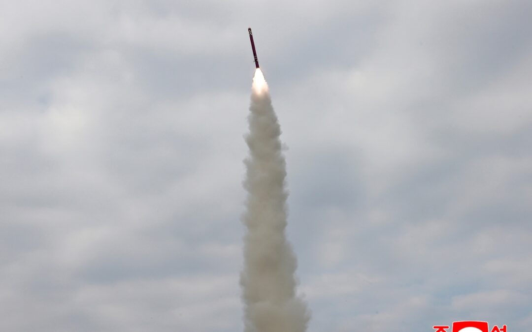 North Korea touts missile tests as Trump visits South Korea