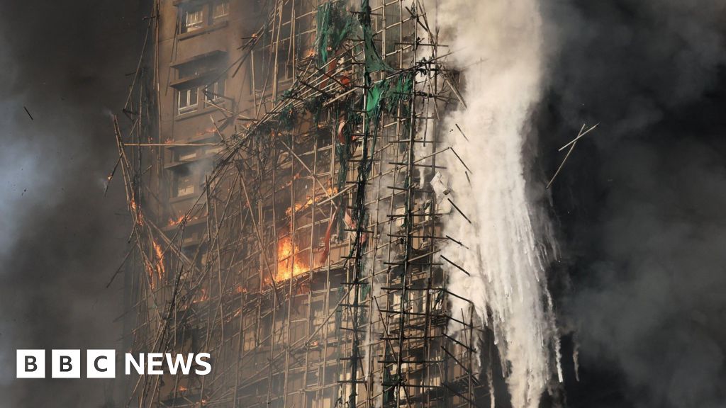 Firefighters search for hundreds still missing in devastating Hong Kong tower blocks fire