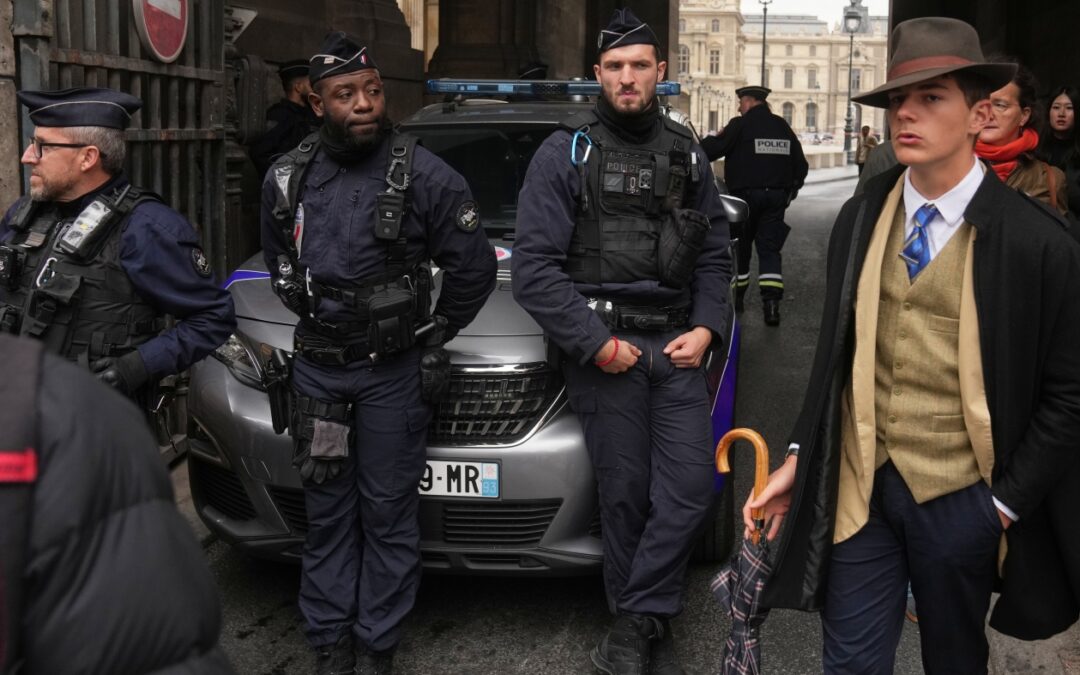 Fedora man unmasked: Meet the teen behind the Louvre mystery photo