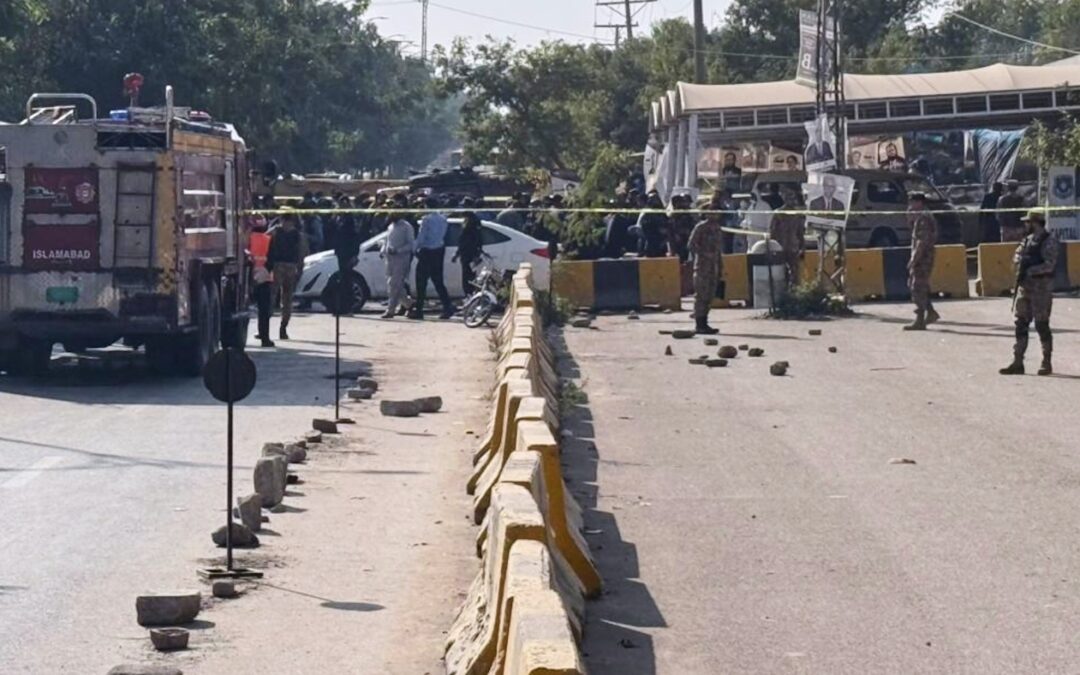 A suicide bomber targets an Islamabad court, killing 12 people and wounding 27