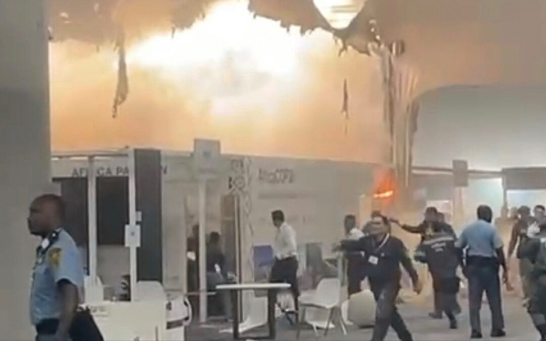 Fire prompts evacuations at U.N. climate talks in Brazil; 13 suffer smoke inhalation