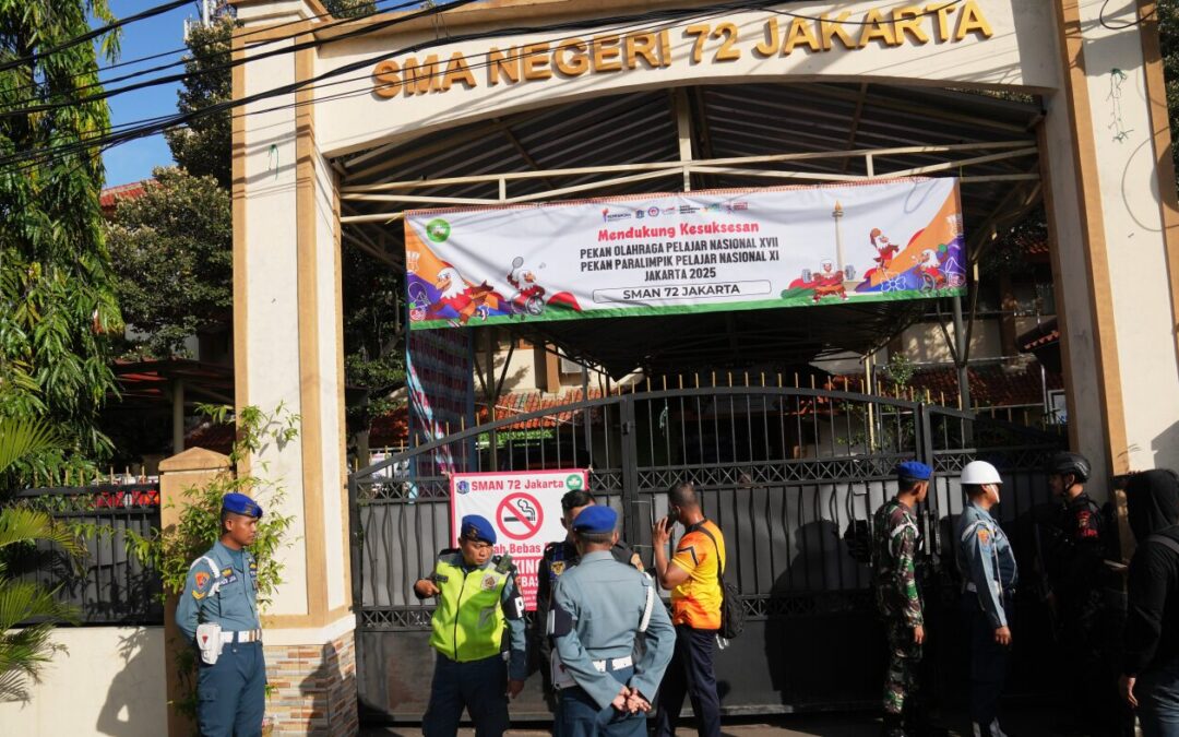 Multiple explosions shake a mosque in an Indonesian high school, injuring dozens