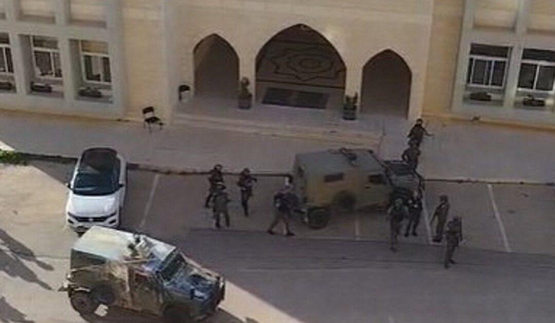 Israeli forces raid two Palestinian universities in the West Bank, reports say