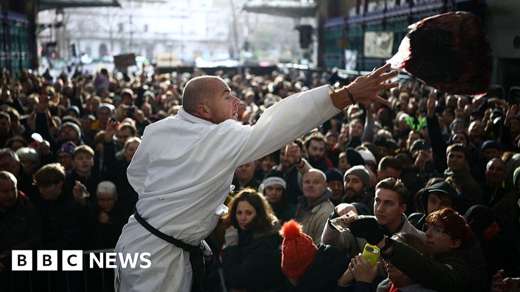Waterskiing Santas and giant cuts of meat: Christmas around the world