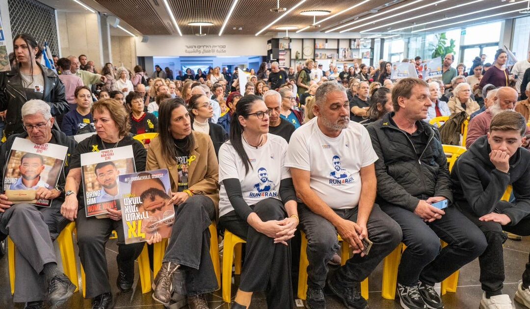 Braving stormy weather, hundreds of Israelis gather to call for return of last Gaza hostage Ran Gvili